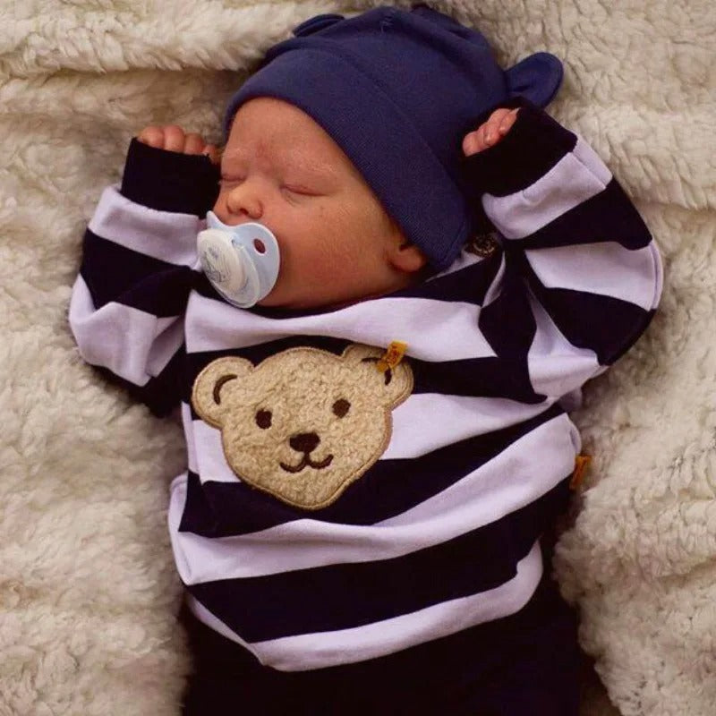Simulated baby rebirth doll with visible 3D skin veins and blood streaks